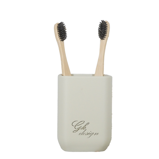 Porte-brosses à dents design en PLA blanc cassé, issu de la gamme Monochrome. Accessoire de salle de bain minimaliste, pratique et éco-responsable