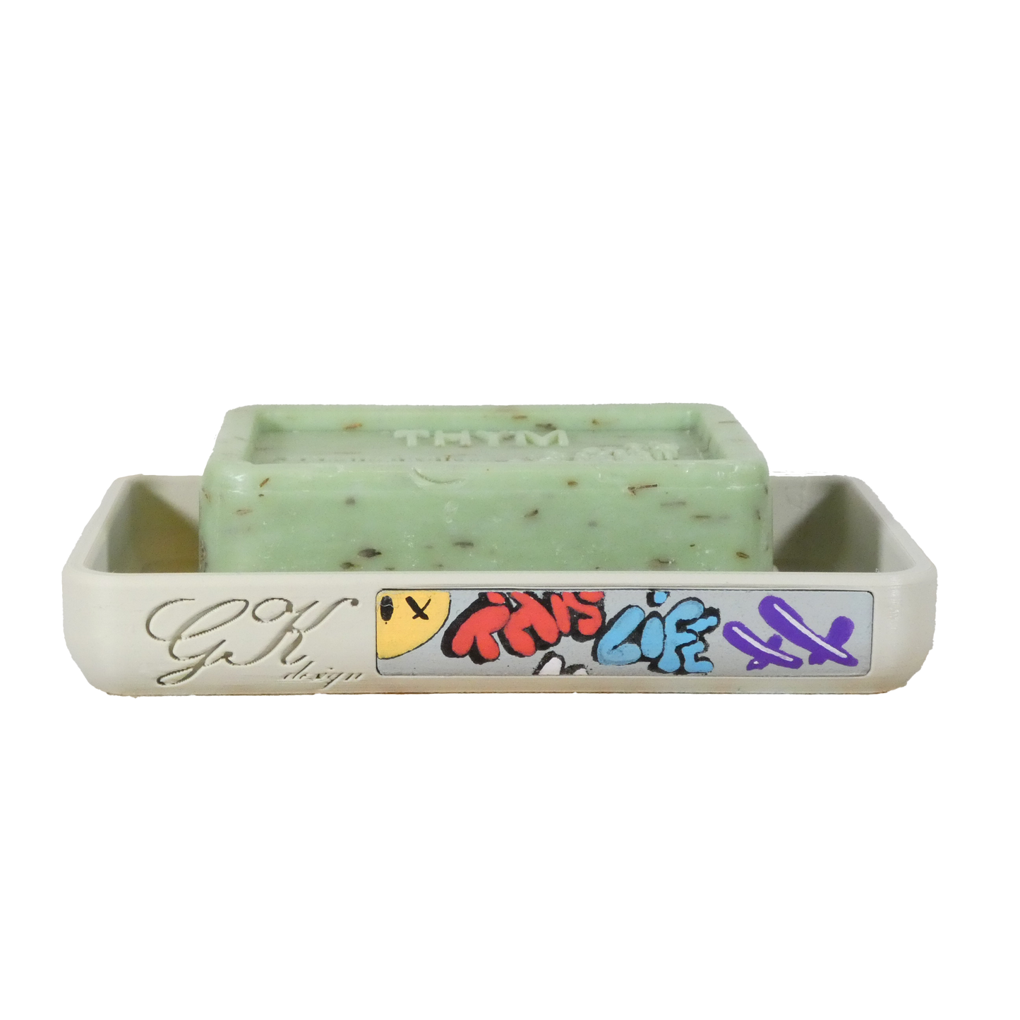 Porte-savon en PLA avec touches de Street Art, disponible en blanc cassé. Accessoire de salle de bain au design urbain et original, éco-responsable